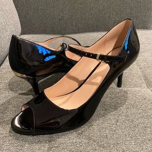 Calvin Klein Leila Black Patent Leather Peep Toe Pump. Approx 2.75” - 3” heel